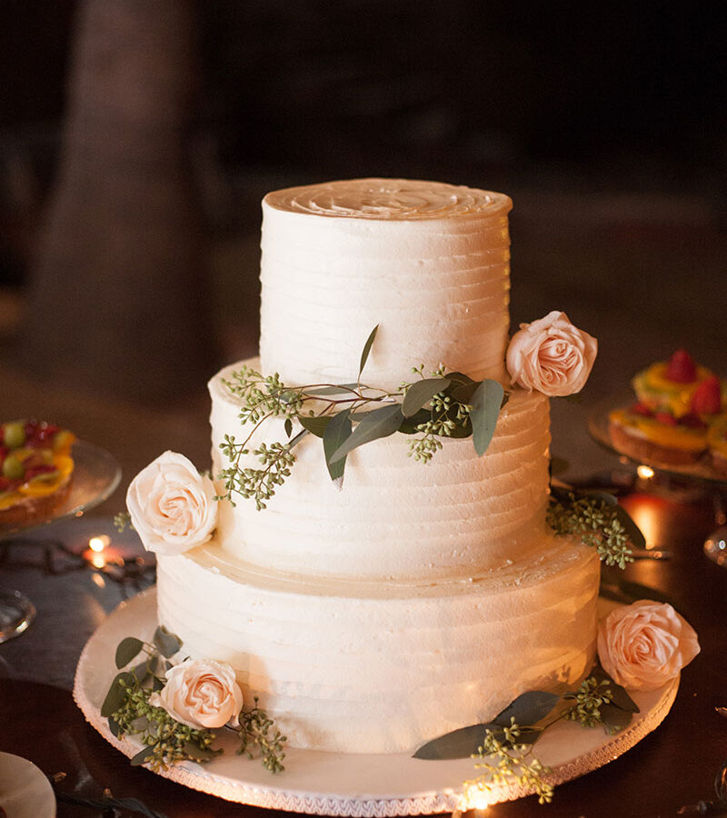 white cake for wedding with flowers on it