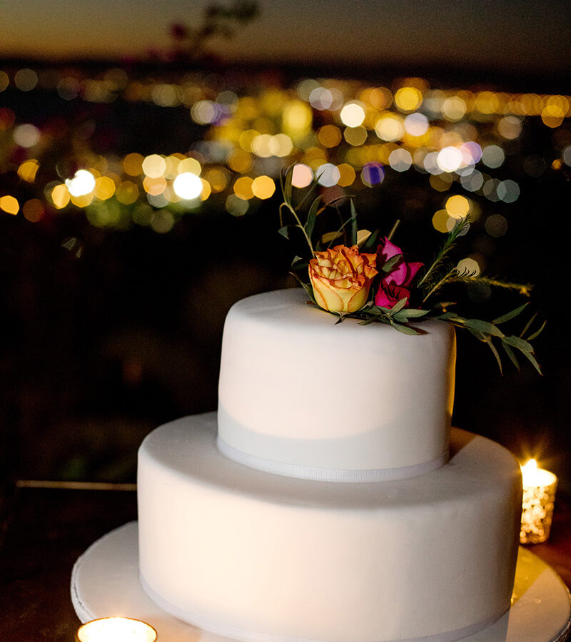white cake with flowers on top