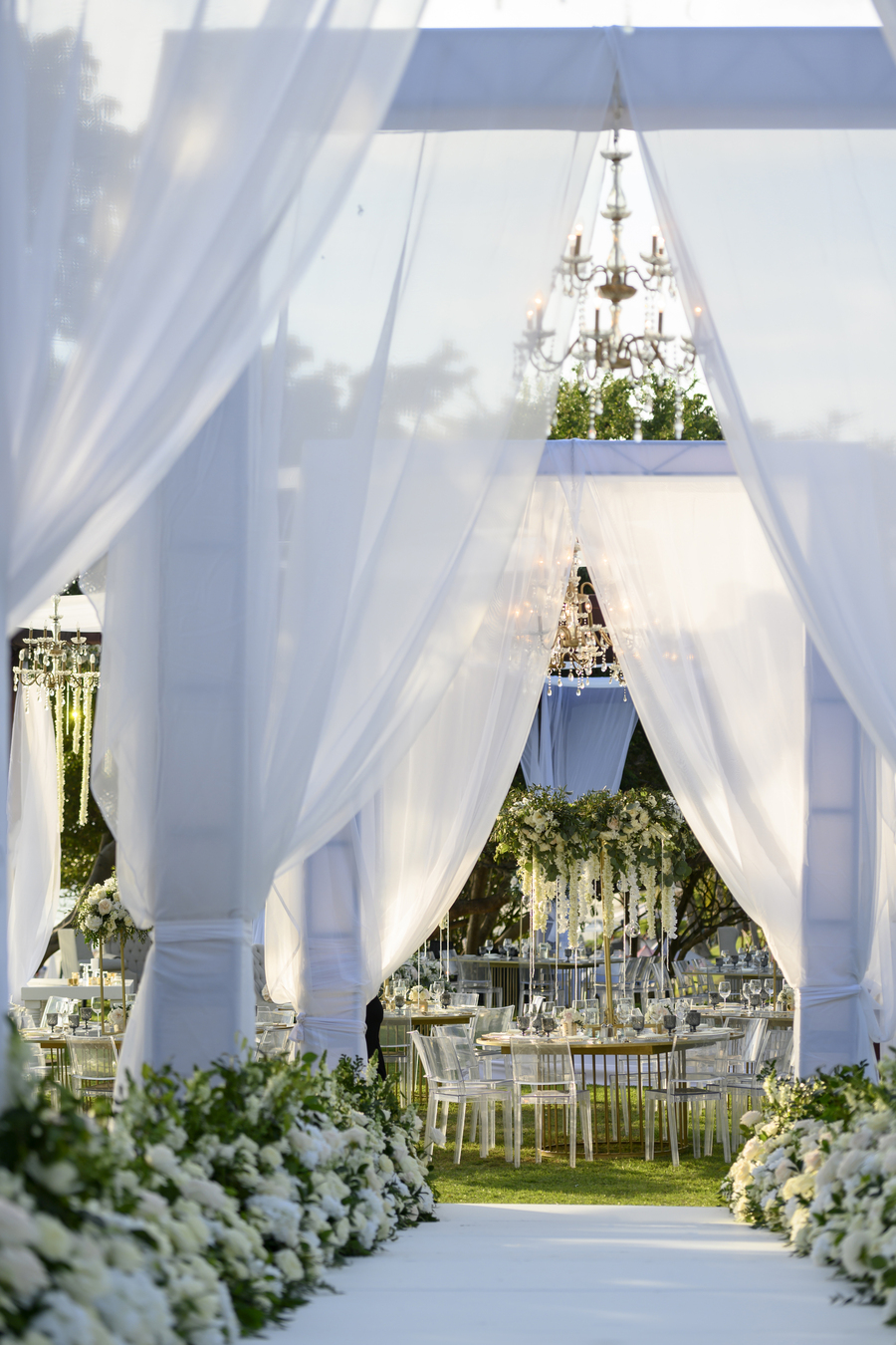 romantic destination wedding with greenery and white arches in puerto vallarta