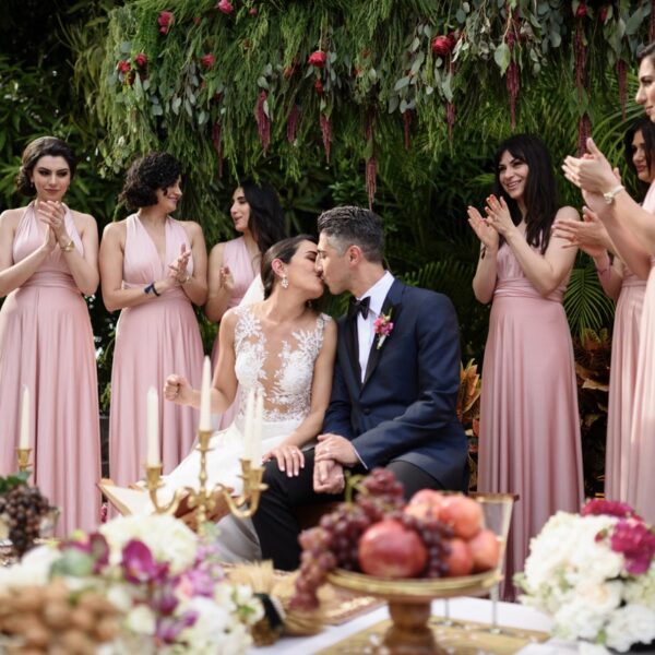 romantic green wedding with rosé dresses for bridemaids and white flowers