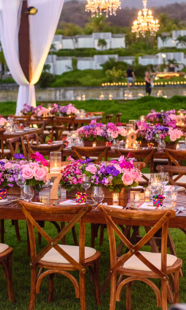 wedding reception with flowers pink and purple in puerto vallarta