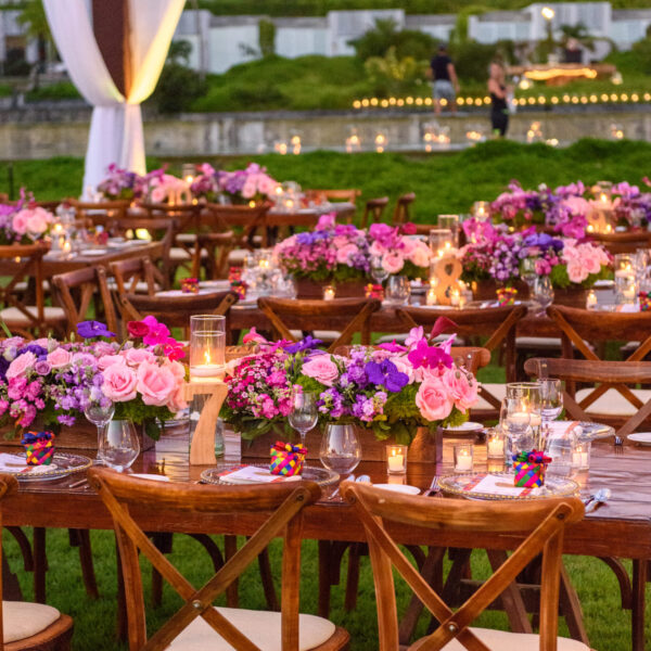 wedding reception with flowers pink and purple in puerto vallarta