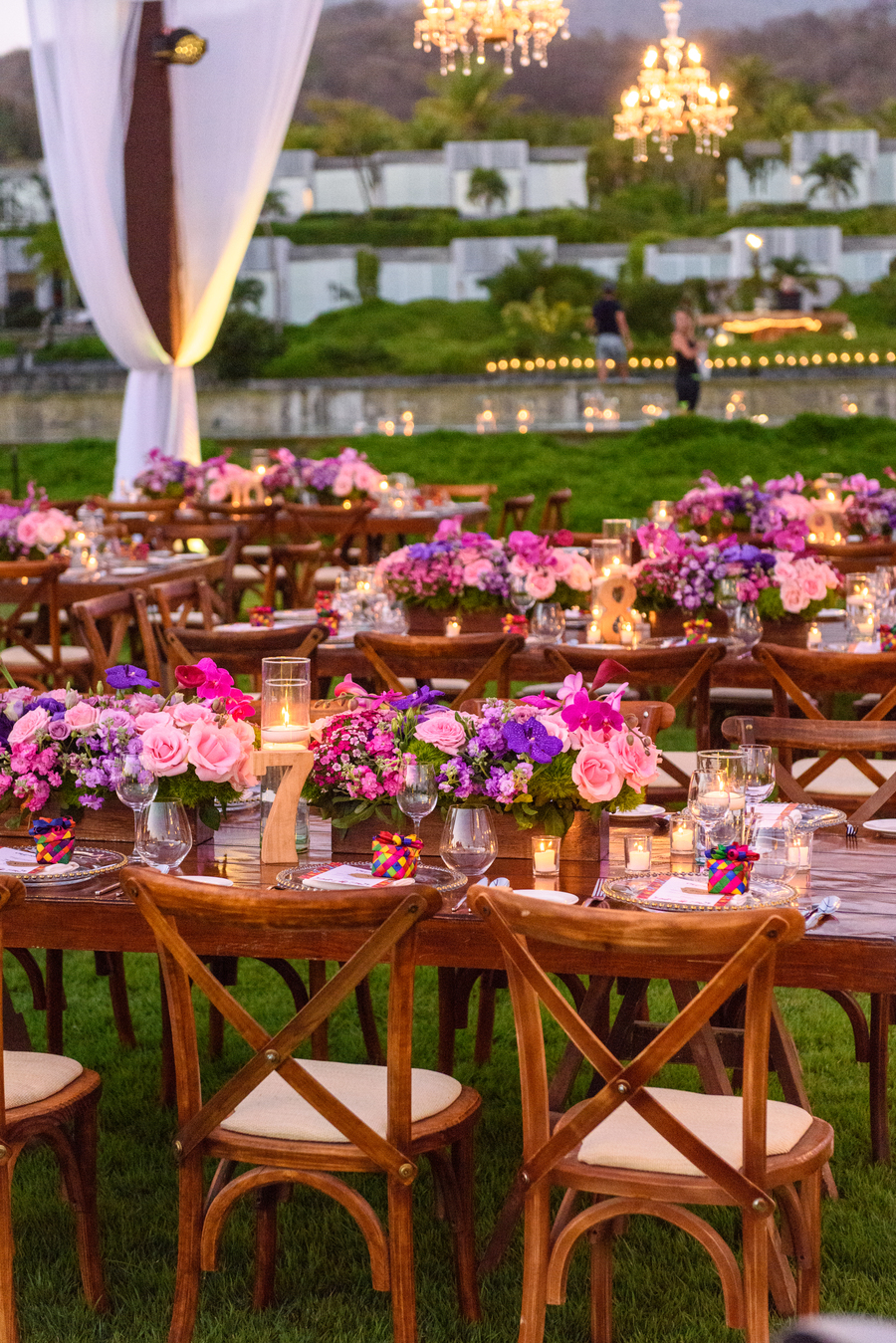 wedding reception with flowers pink and purple in puerto vallarta